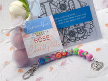 Load image into Gallery viewer, Mother's Day Care Gift, Floral Bead, Bag or Key Charm Gift pack with Heart Charm, with Colouring in card, bath fizzes and other curated goodies