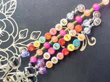 Load image into Gallery viewer, Handbag or key charm accessory with cowrie shell and heart charms and floral summer beachy festival beads, unique gift for her, just breathe