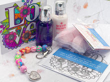 Load image into Gallery viewer, Mother's Day Care Gift, Floral Bead, Bag or Key Charm Gift pack with Heart Charm, with Colouring in card, bath fizzes and other curated goodies