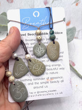 Load image into Gallery viewer, Hand Engraved Beach Pebble Necklace – Ethically Sourced Coastal Jewellery with Natural Beach Stones and Pearl for a Boho Summer Look