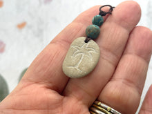 Load image into Gallery viewer, Hand Engraved Beach Pebble Necklace – Ethically Sourced Coastal Jewellery with Natural Beach Stones and Pearl for a Boho Summer Look
