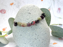 Load image into Gallery viewer, A calming tourmaline bracelet with 10 smooth stones, one for each deep breath. For anxiety, overwhelm, and those who need a moment of quiet within.
