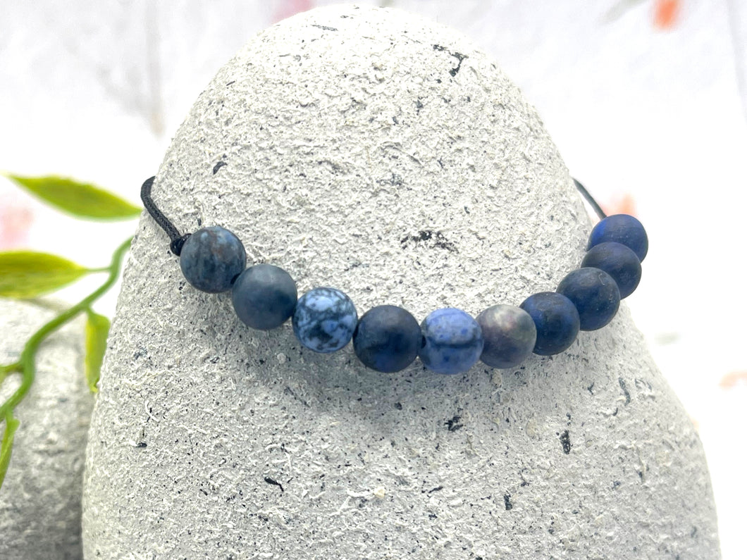 Dumortierite 10 breaths meditation bracelet with blue matte beads on black cord