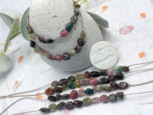 Load image into Gallery viewer, A Calming Tourmaline Bracelet with 10 smooth natural stones, one for each deep breath. For anxiety, overwhelm, and those who need a moment of quiet within.
