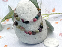 Load image into Gallery viewer, A Calming Tourmaline Bracelet with 10 smooth natural stones, one for each deep breath. For anxiety, overwhelm, and those who need a moment of quiet within.
