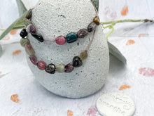 Load image into Gallery viewer, A Calming Tourmaline Bracelet with 10 smooth natural stones, one for each deep breath. For anxiety, overwhelm, and those who need a moment of quiet within.
