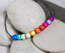 Load image into Gallery viewer, Pride, 10 Breaths Bracelet, Breathe Bracelet. Rainbow Illusion Magic Bead Bracelet
